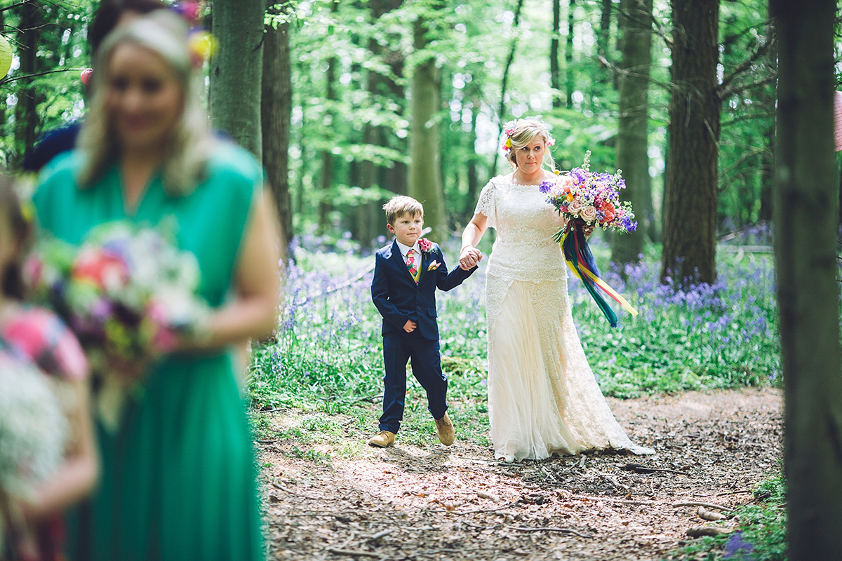 A bridal boutique owner's colourful, whimsical, bluebell filled woodland wedding. Photography by Olegs Samsonovs.