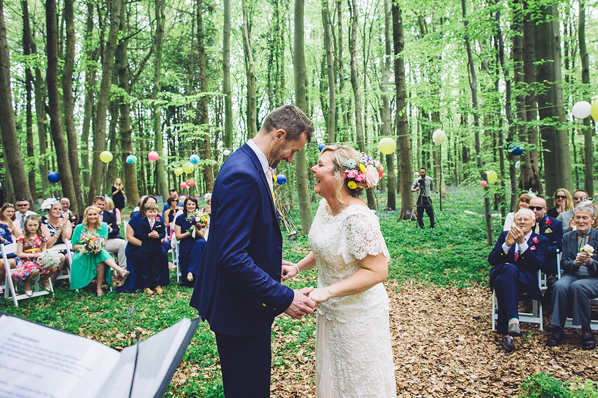 A bridal boutique owner's colourful, whimsical, bluebell filled woodland wedding. Photography by Olegs Samsonovs.