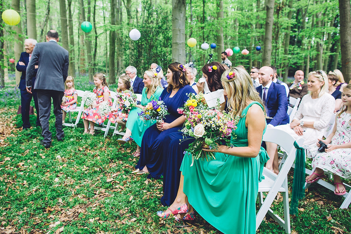 A bridal boutique owner's colourful, whimsical, bluebell filled woodland wedding. Photography by Olegs Samsonovs.