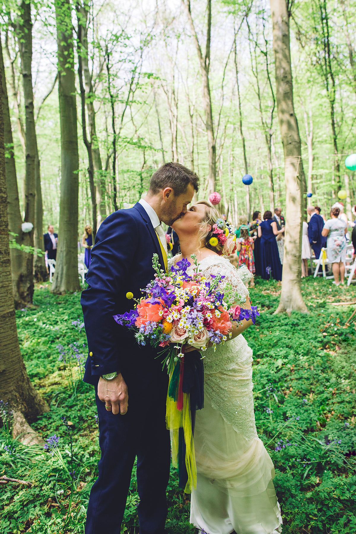 A bridal boutique owner's colourful, whimsical, bluebell filled woodland wedding. Photography by Olegs Samsonovs.