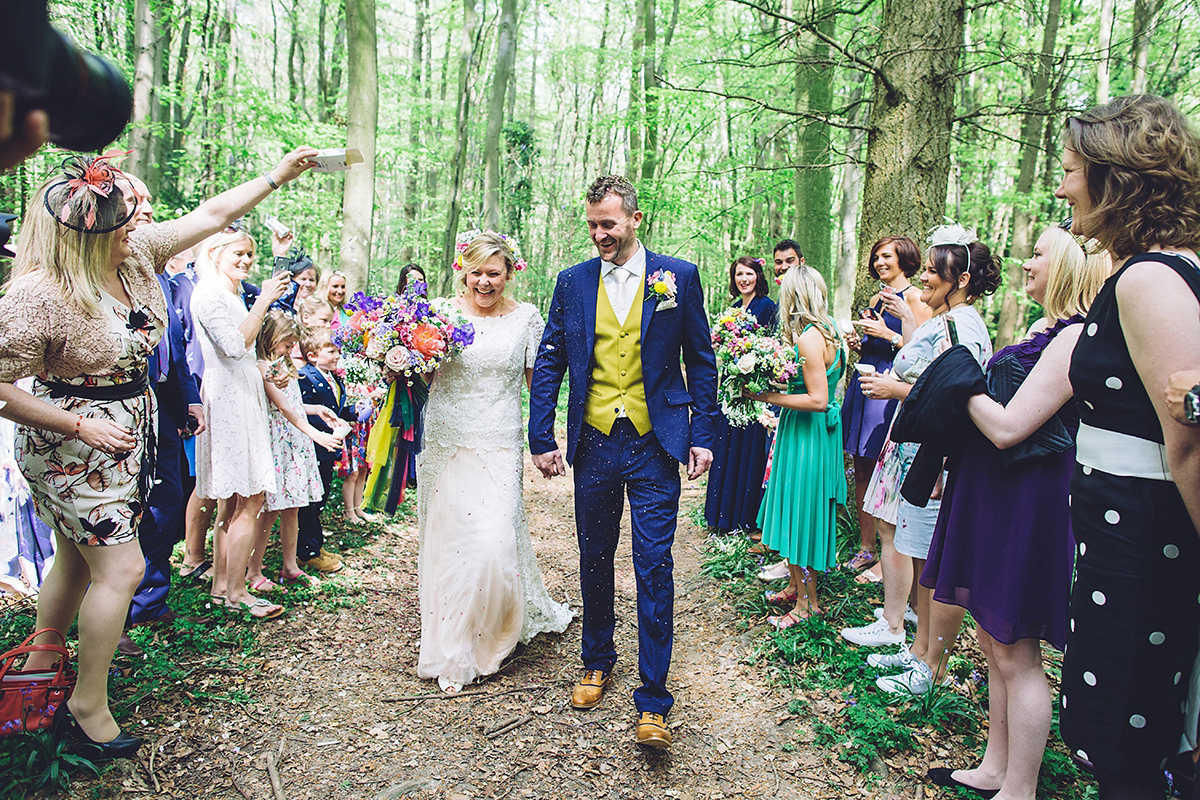 A bridal boutique owner's colourful, whimsical, bluebell filled woodland wedding. Photography by Olegs Samsonovs.