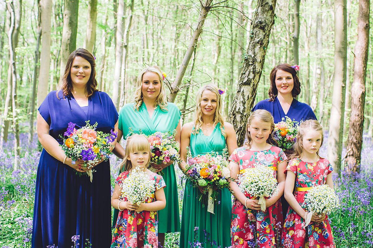 A bridal boutique owner's colourful, whimsical, bluebell filled woodland wedding. Photography by Olegs Samsonovs.