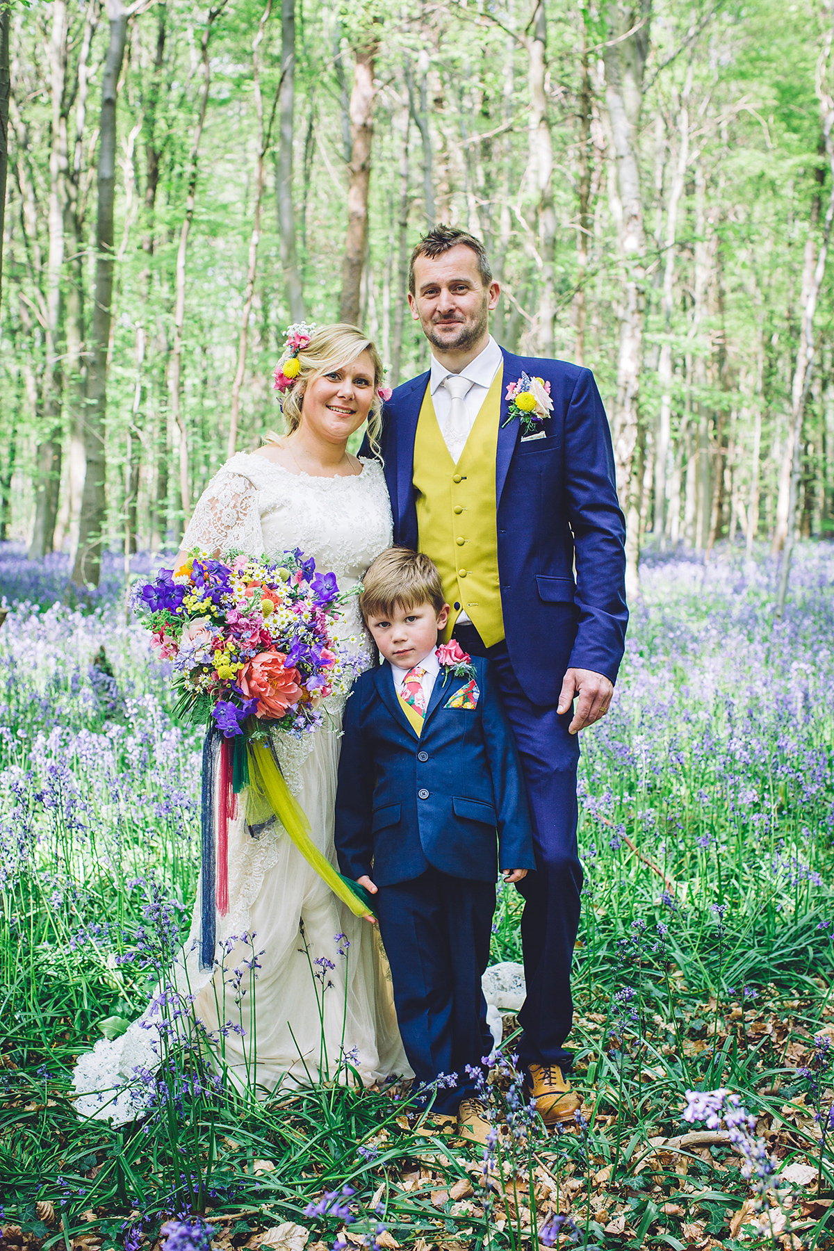 A bridal boutique owner's colourful, whimsical, bluebell filled woodland wedding. Photography by Olegs Samsonovs.