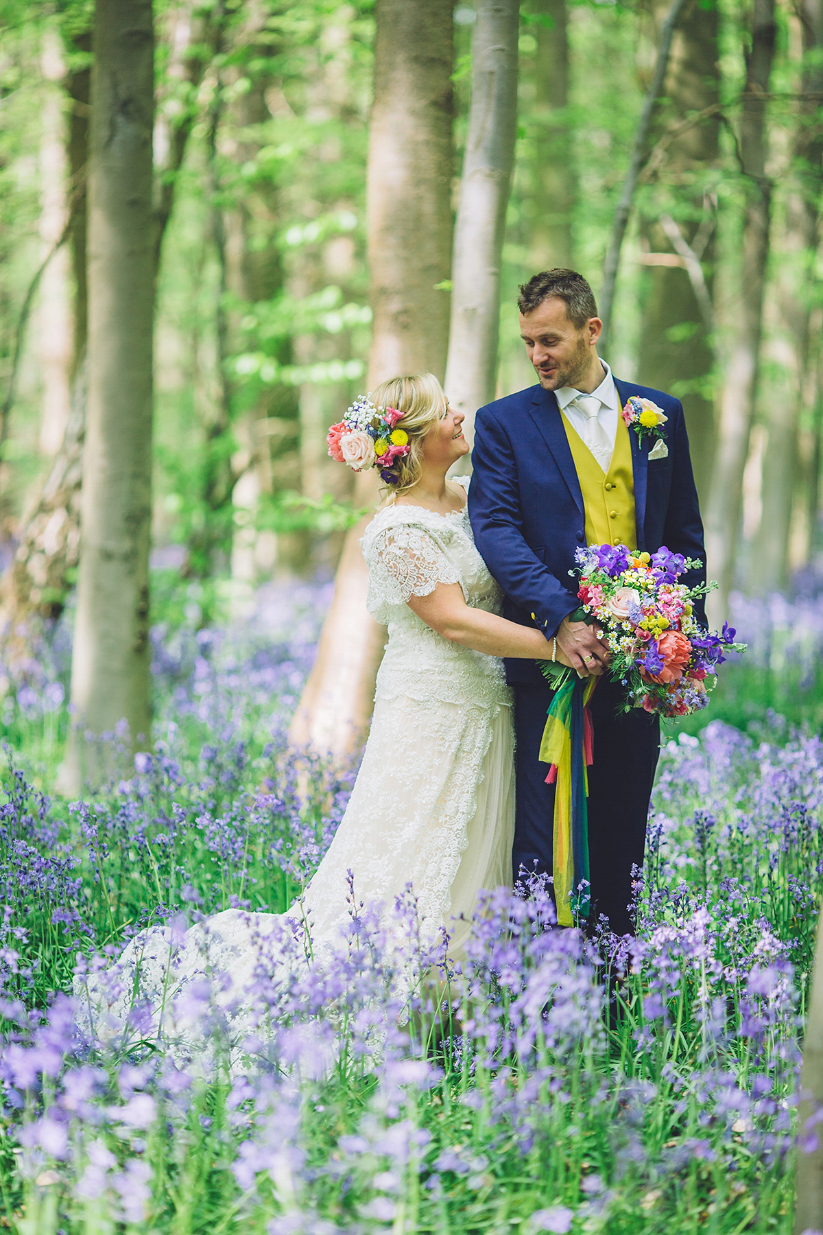 A bridal boutique owner's colourful, whimsical, bluebell filled woodland wedding. Photography by Olegs Samsonovs.