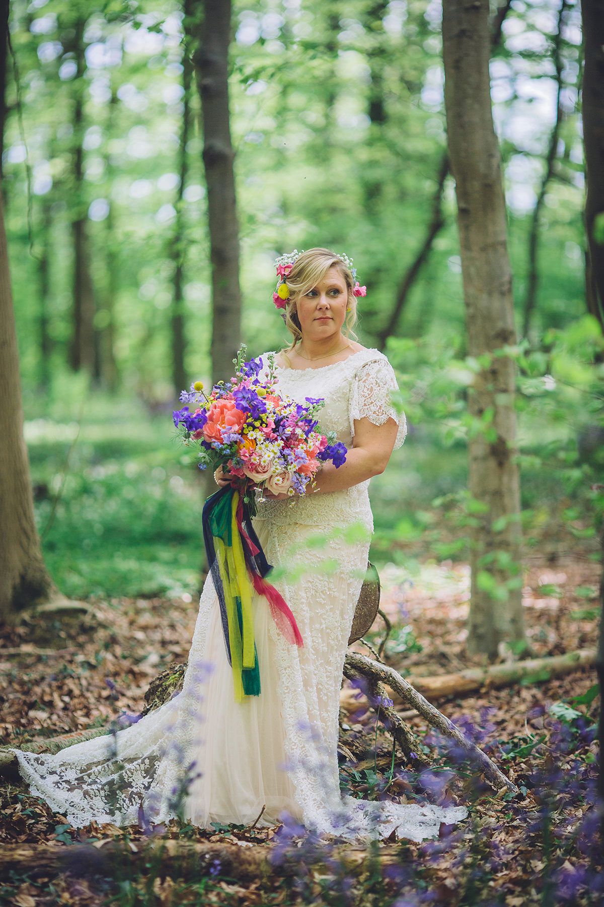 A bridal boutique owner's colourful, whimsical, bluebell filled woodland wedding. Photography by Olegs Samsonovs.