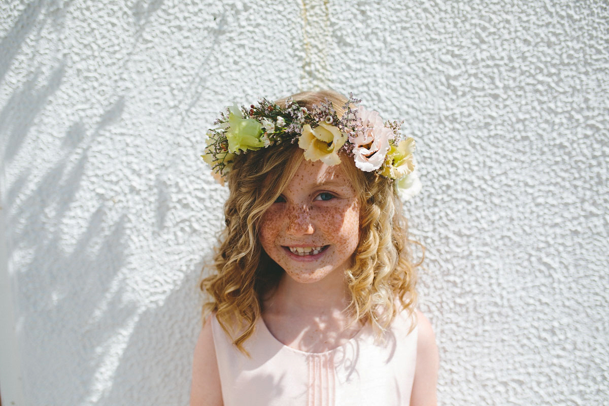 A floral wedding dress by Sassi Holford for a Summer wedding in the Peak District. Flowers by Campbell's Flowers, photography by Ellie Grace.