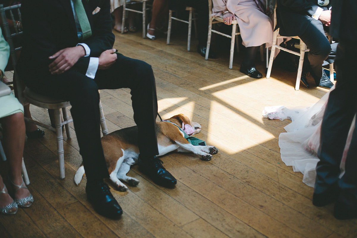 A floral wedding dress by Sassi Holford for a Summer wedding in the Peak District. Flowers by Campbell's Flowers, photography by Ellie Grace.