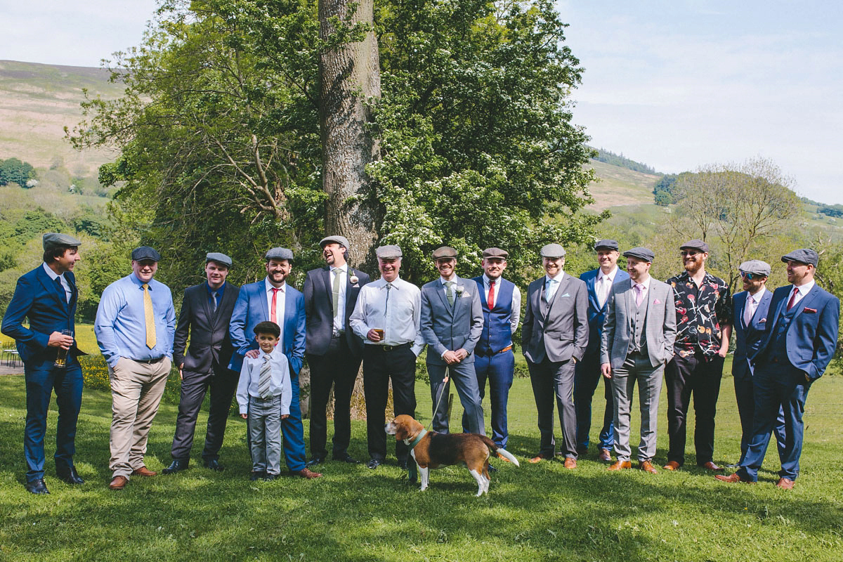 A floral wedding dress by Sassi Holford for a Summer wedding in the Peak District. Flowers by Campbell's Flowers, photography by Ellie Grace.