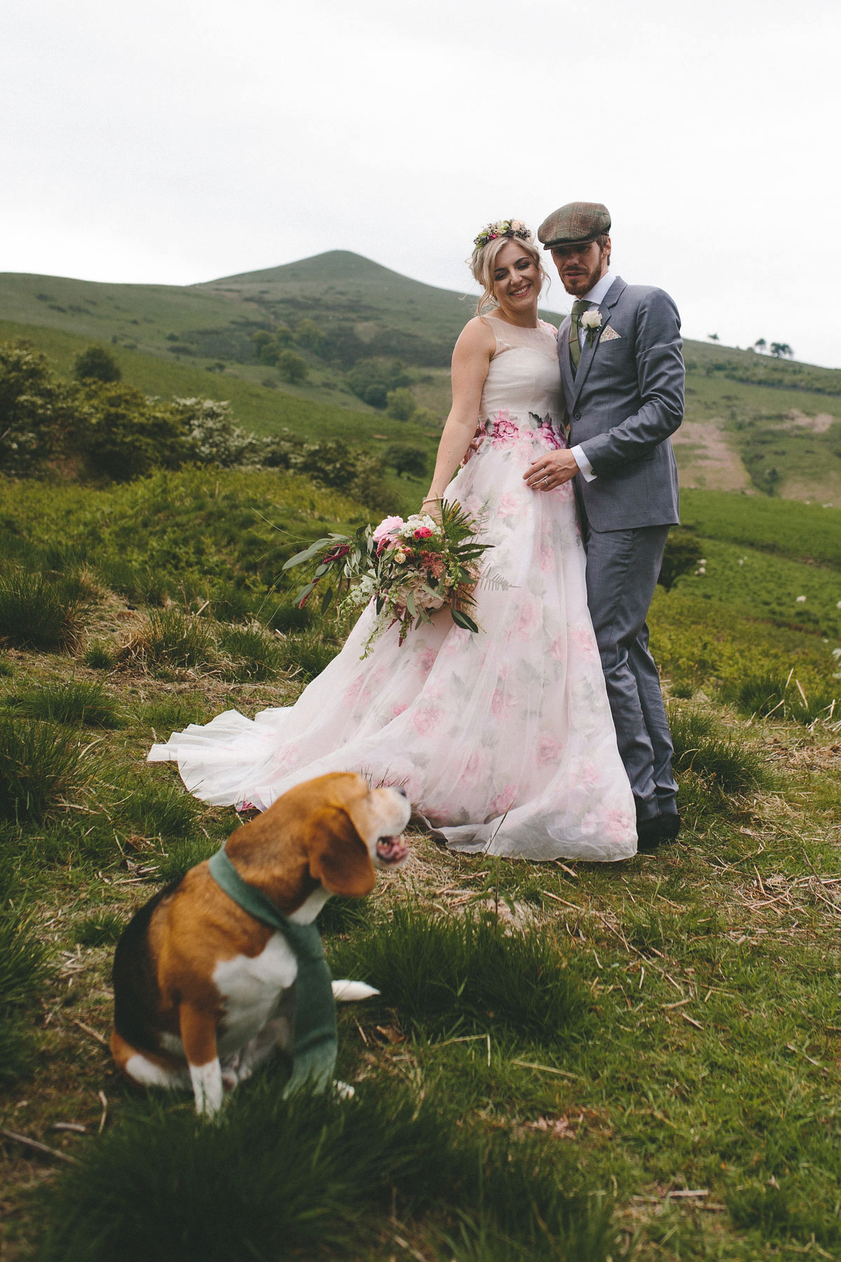 A floral wedding dress by Sassi Holford for a Summer wedding in the Peak District. Flowers by Campbell's Flowers, photography by Ellie Grace.