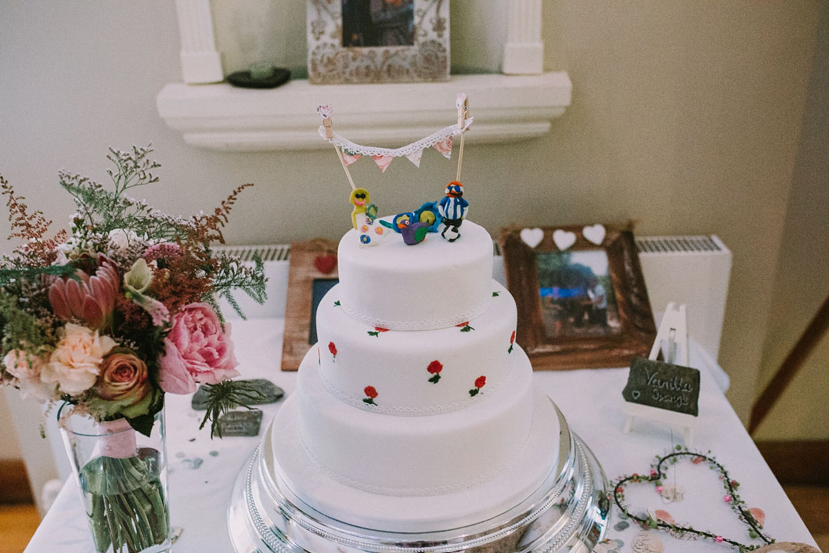 A floral wedding dress by Sassi Holford for a Summer wedding in the Peak District. Flowers by Campbell's Flowers, photography by Ellie Grace.