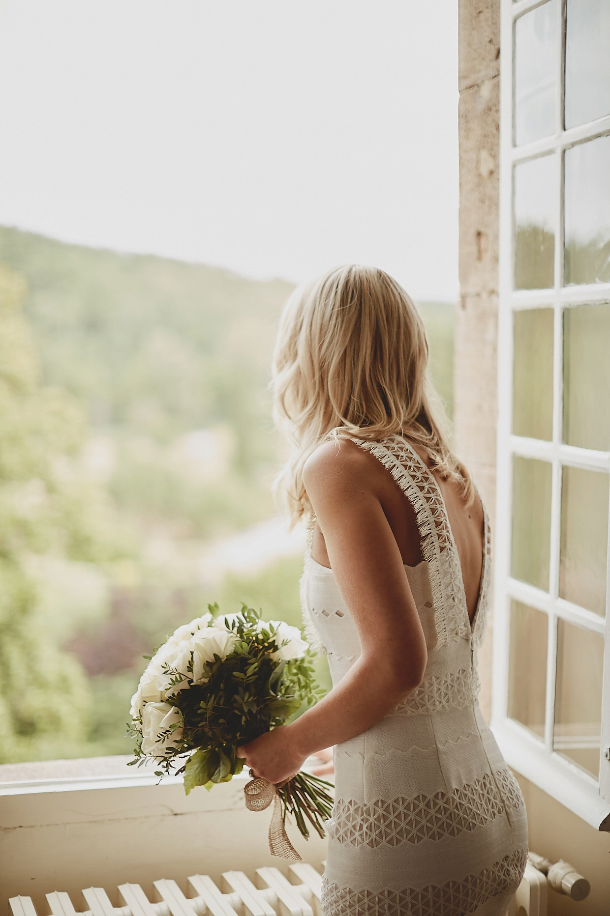 Katie wore a Jonathan Simkhai dress for her chic and rustic wedding at L'Abbay Chateau De Camon in France. Photography by Andrew D Hamilton