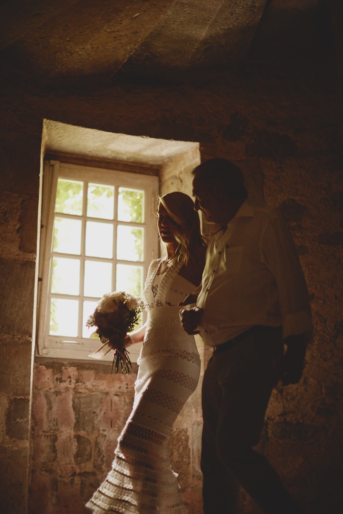 Katie wore a Jonathan Simkhai dress for her chic and rustic wedding at L'Abbay Chateau De Camon in France. Photography by Andrew D Hamilton