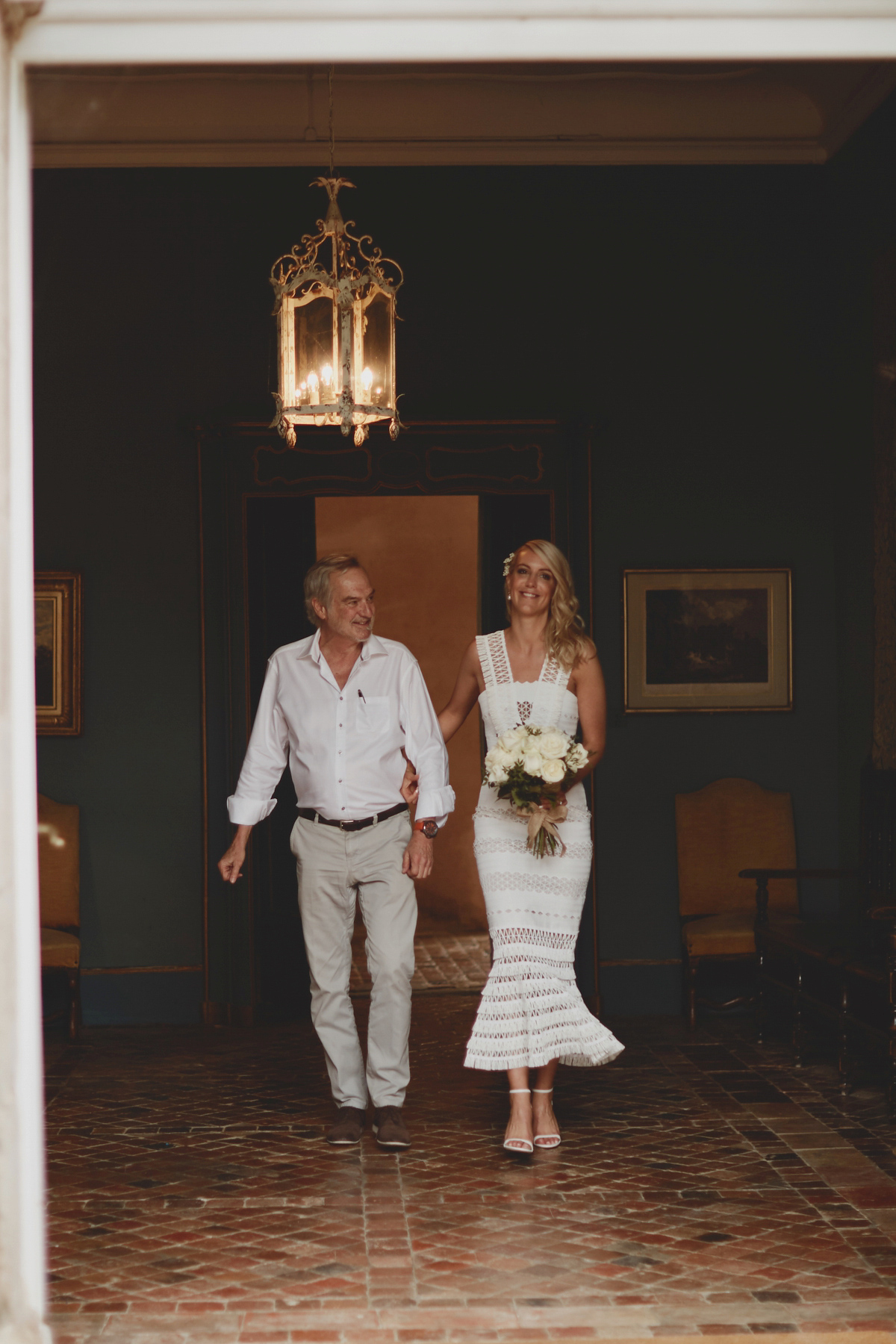 Katie wore a Jonathan Simkhai dress for her chic and rustic wedding at L'Abbay Chateau De Camon in France. Photography by Andrew D Hamilton