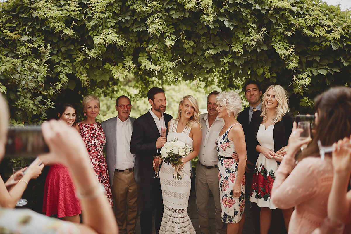 Katie wore a Jonathan Simkhai dress for her chic and rustic wedding at L'Abbay Chateau De Camon in France. Photography by Andrew D Hamilton