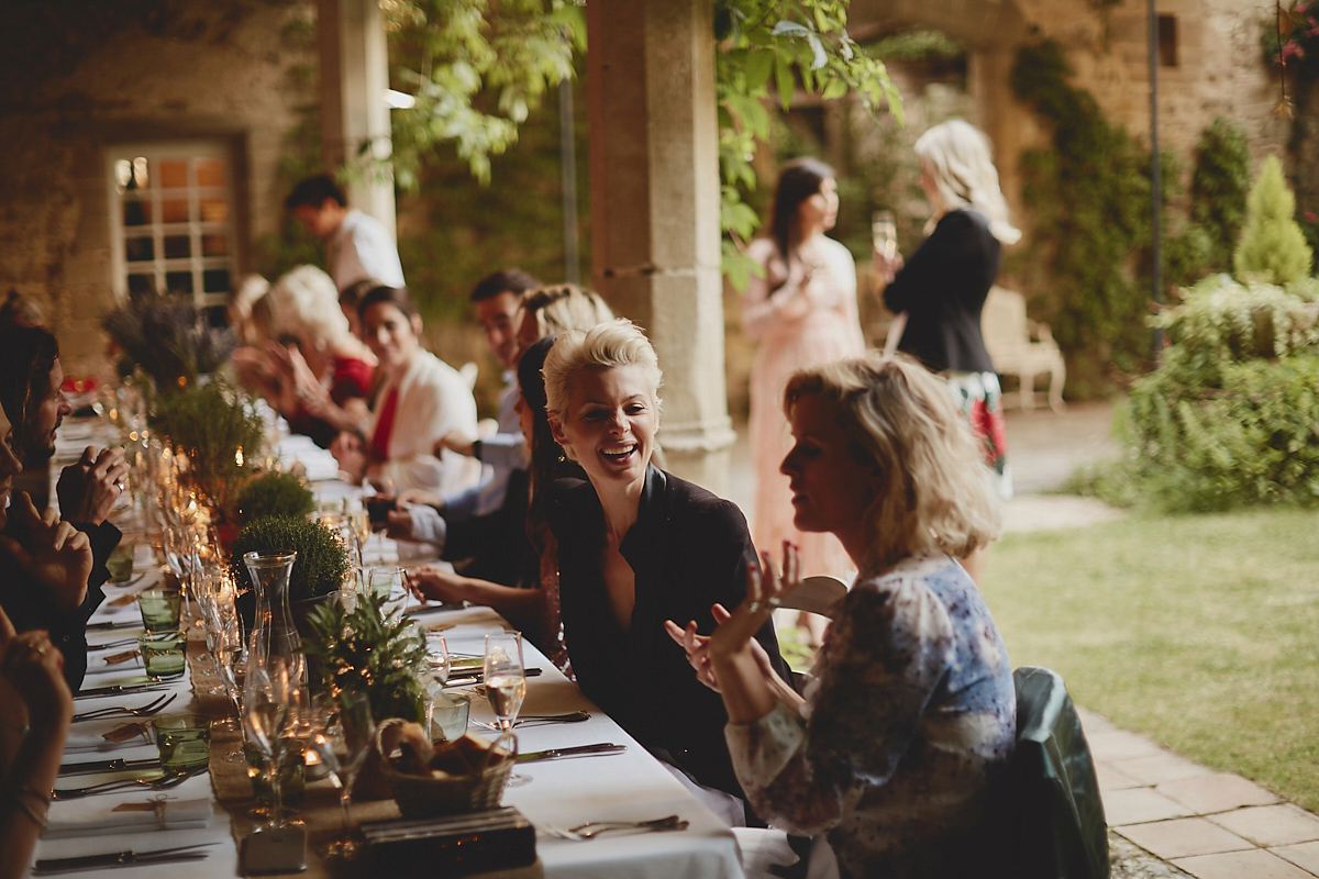 Katie wore a Jonathan Simkhai dress for her chic and rustic wedding at L'Abbay Chateau De Camon in France. Photography by Andrew D Hamilton