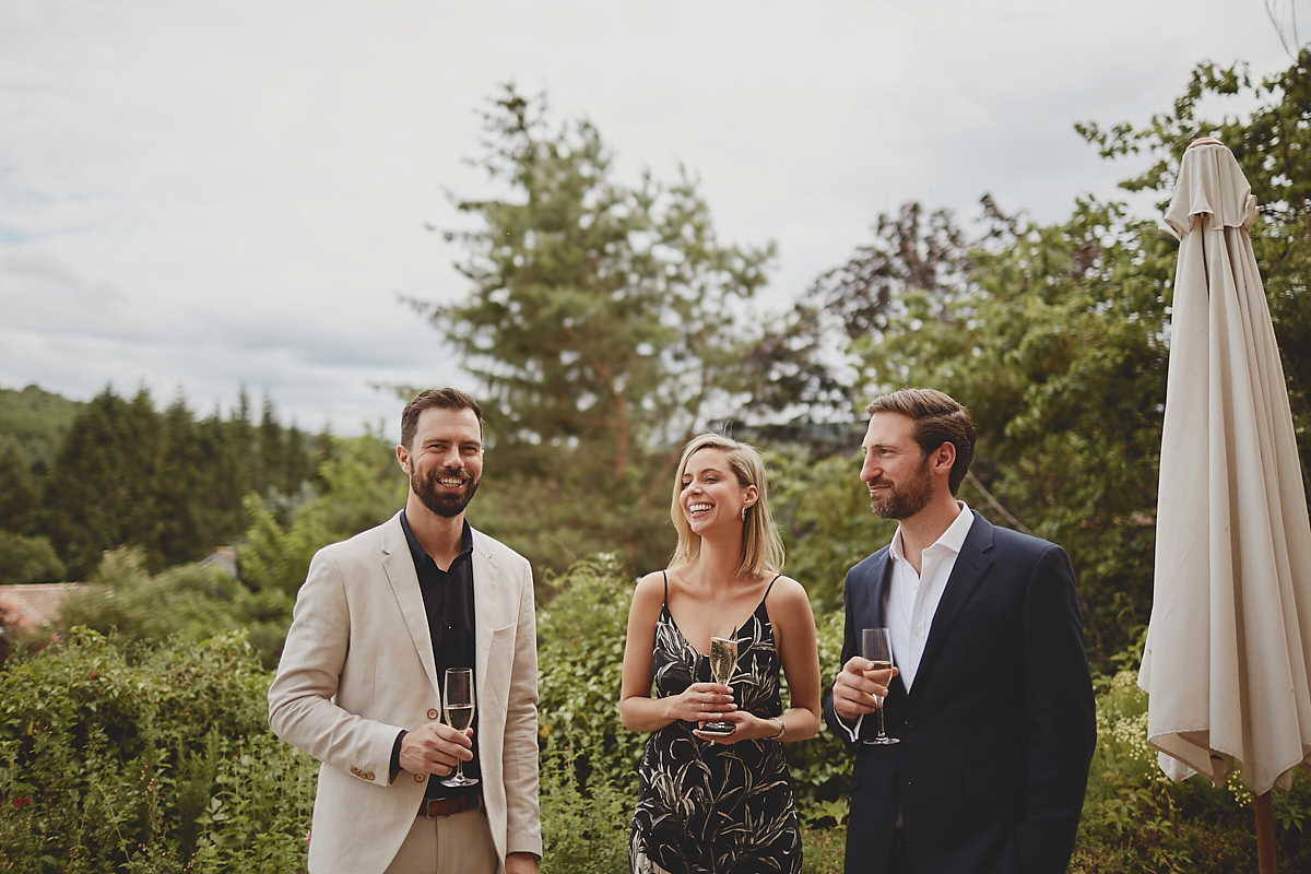 Katie wore a Jonathan Simkhai dress for her chic and rustic wedding at L'Abbay Chateau De Camon in France. Photography by Andrew D Hamilton