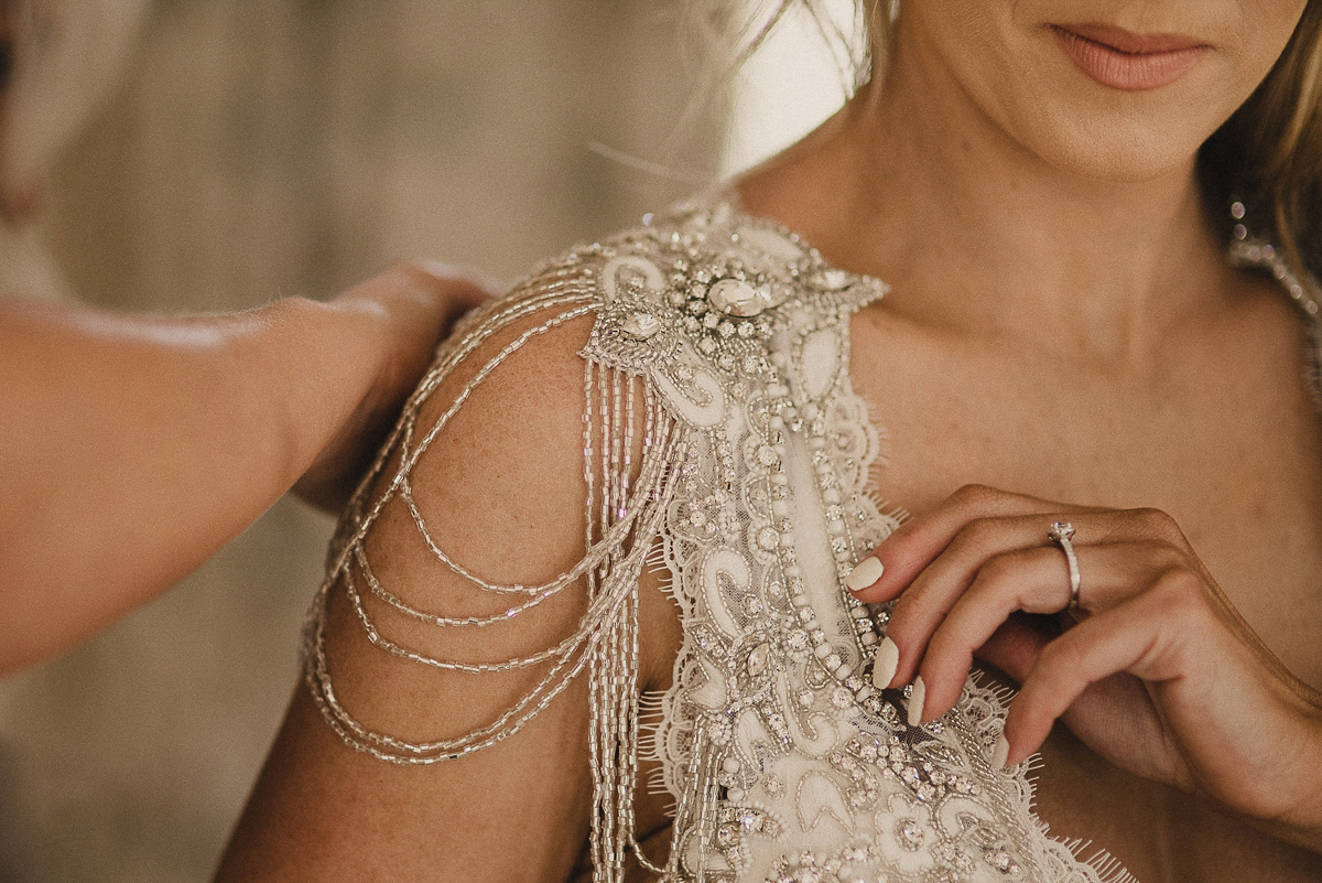 Bride Leona wears an Anna Campbell gown for her bohemian inspired wedding in Ireland. Photography by Tomasz Kornas.