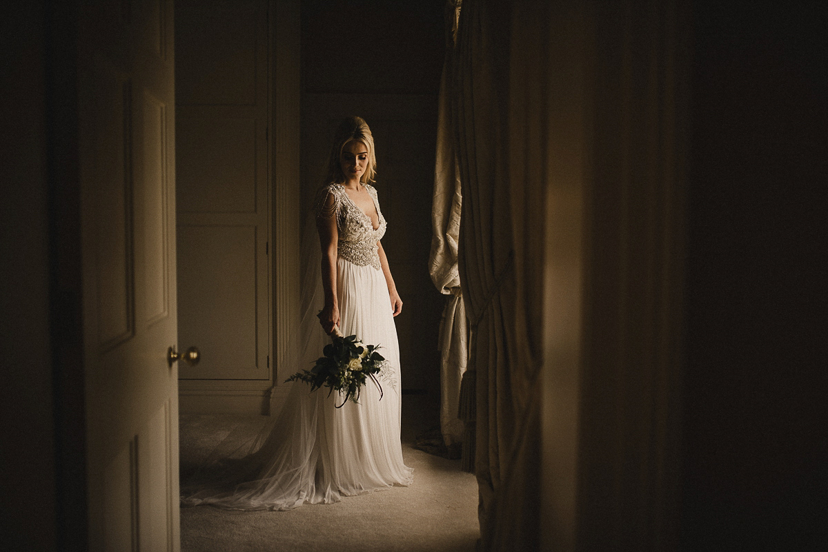 Bride Leona wears an Anna Campbell gown for her bohemian inspired wedding in Ireland. Photography by Tomasz Kornas.