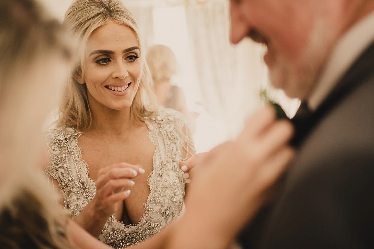 Bride Leona wears an Anna Campbell gown for her bohemian inspired wedding in Ireland. Photography by Tomasz Kornas.