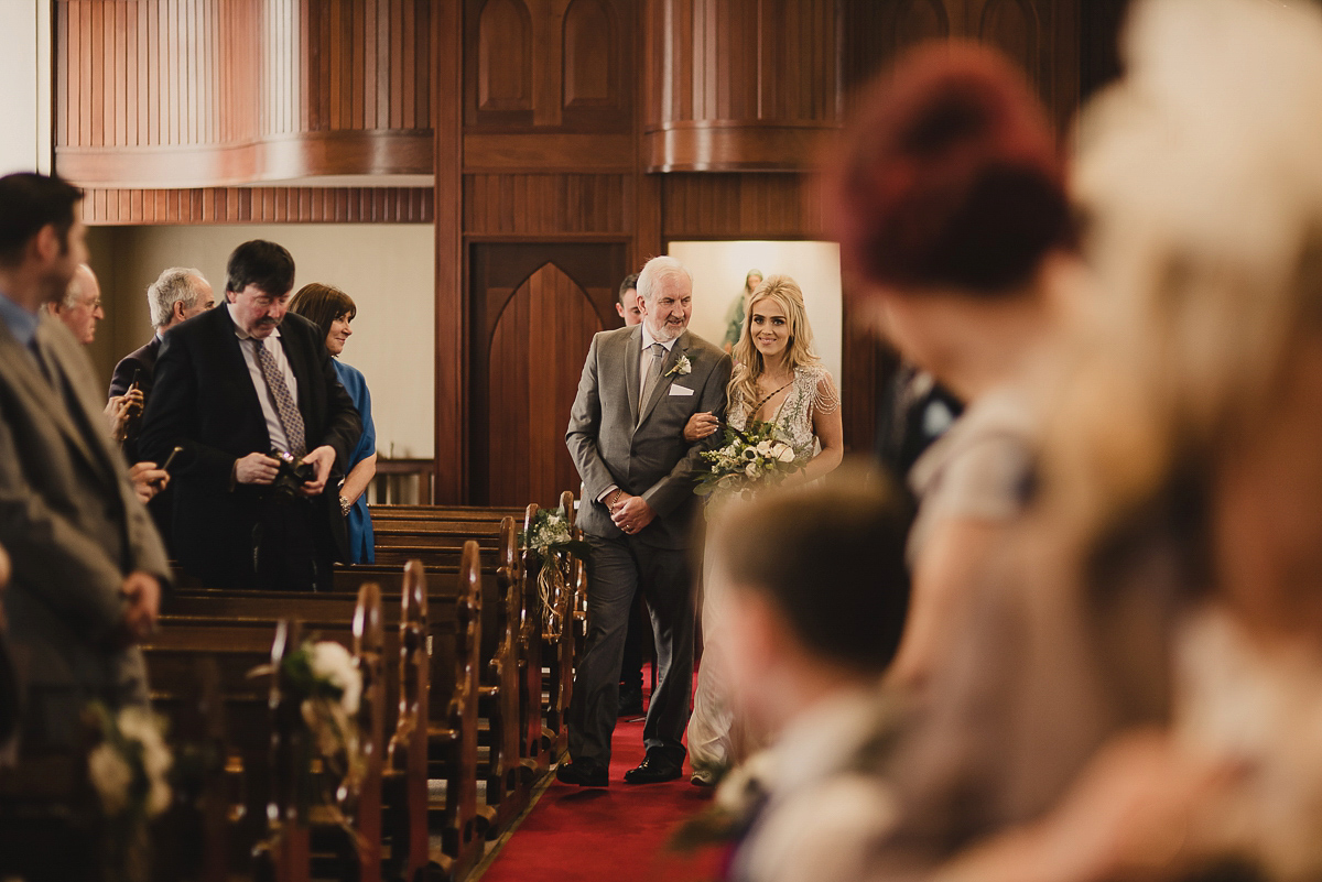 Bride Leona wears an Anna Campbell gown for her bohemian inspired wedding in Ireland. Photography by Tomasz Kornas.