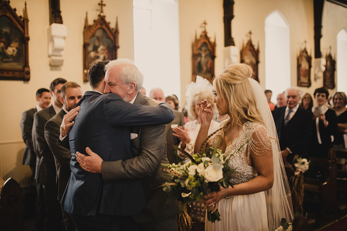 Bride Leona wears an Anna Campbell gown for her bohemian inspired wedding in Ireland. Photography by Tomasz Kornas.