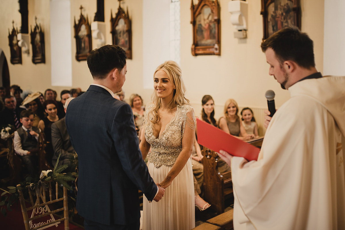 Bride Leona wears an Anna Campbell gown for her bohemian inspired wedding in Ireland. Photography by Tomasz Kornas.