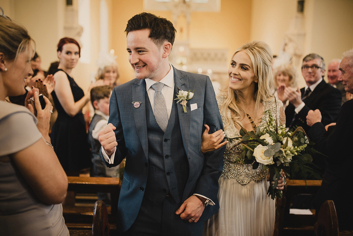 Bride Leona wears an Anna Campbell gown for her bohemian inspired wedding in Ireland. Photography by Tomasz Kornas.