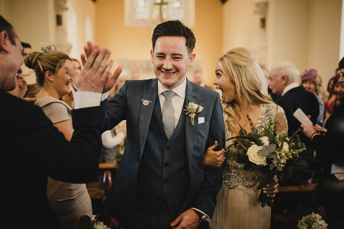 Bride Leona wears an Anna Campbell gown for her bohemian inspired wedding in Ireland. Photography by Tomasz Kornas.