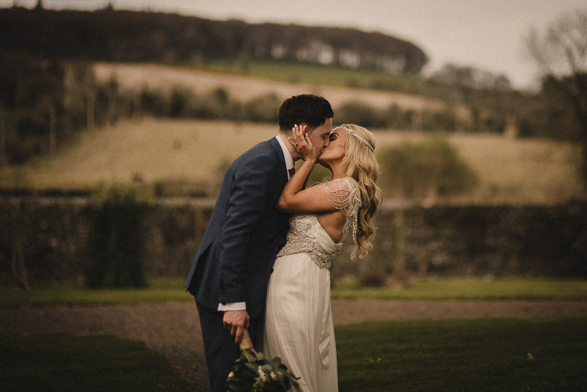 Bride Leona wears an Anna Campbell gown for her bohemian inspired wedding in Ireland. Photography by Tomasz Kornas.