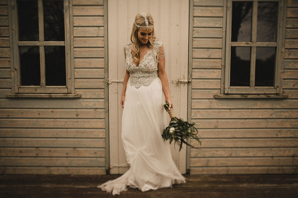 Bride Leona wears an Anna Campbell gown for her bohemian inspired wedding in Ireland. Photography by Tomasz Kornas.