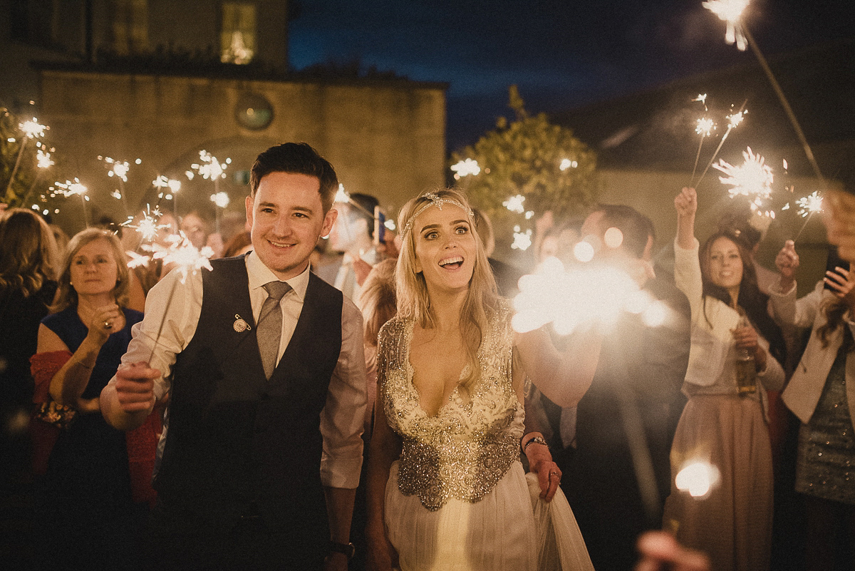 Bride Leona wears an Anna Campbell gown for her bohemian inspired wedding in Ireland. Photography by Tomasz Kornas.