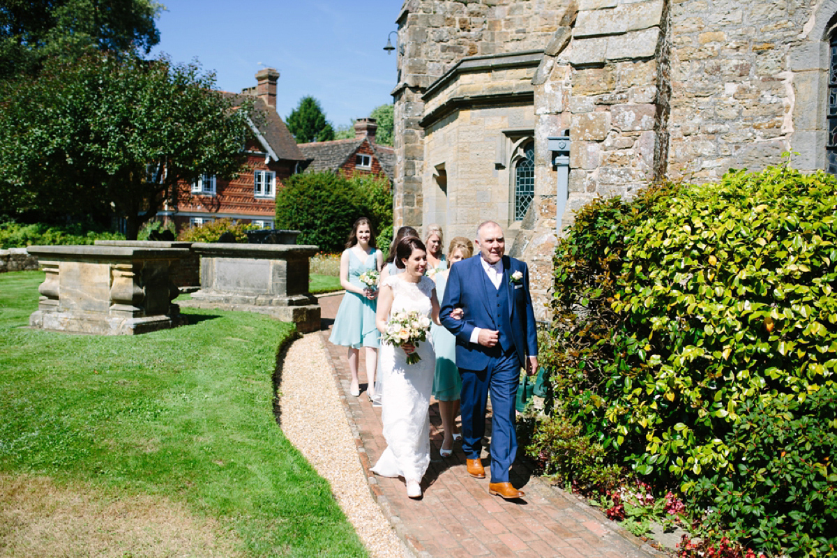 Hollie wore a Lusan Mandongus gown for her tipi wedding set in the Sussex countryside. Photography by Hayley Savage.