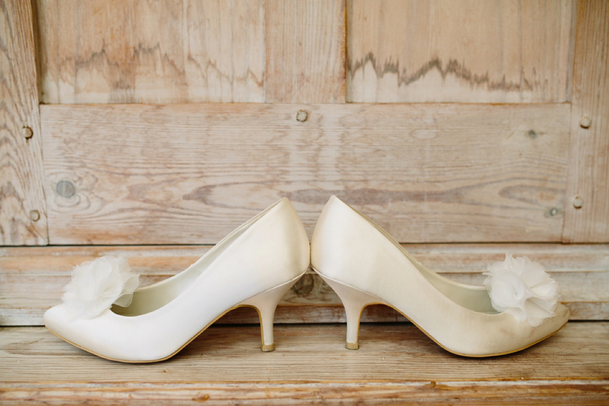 Hollie wore a Lusan Mandongus gown for her tipi wedding set in the Sussex countryside. Photography by Hayley Savage.