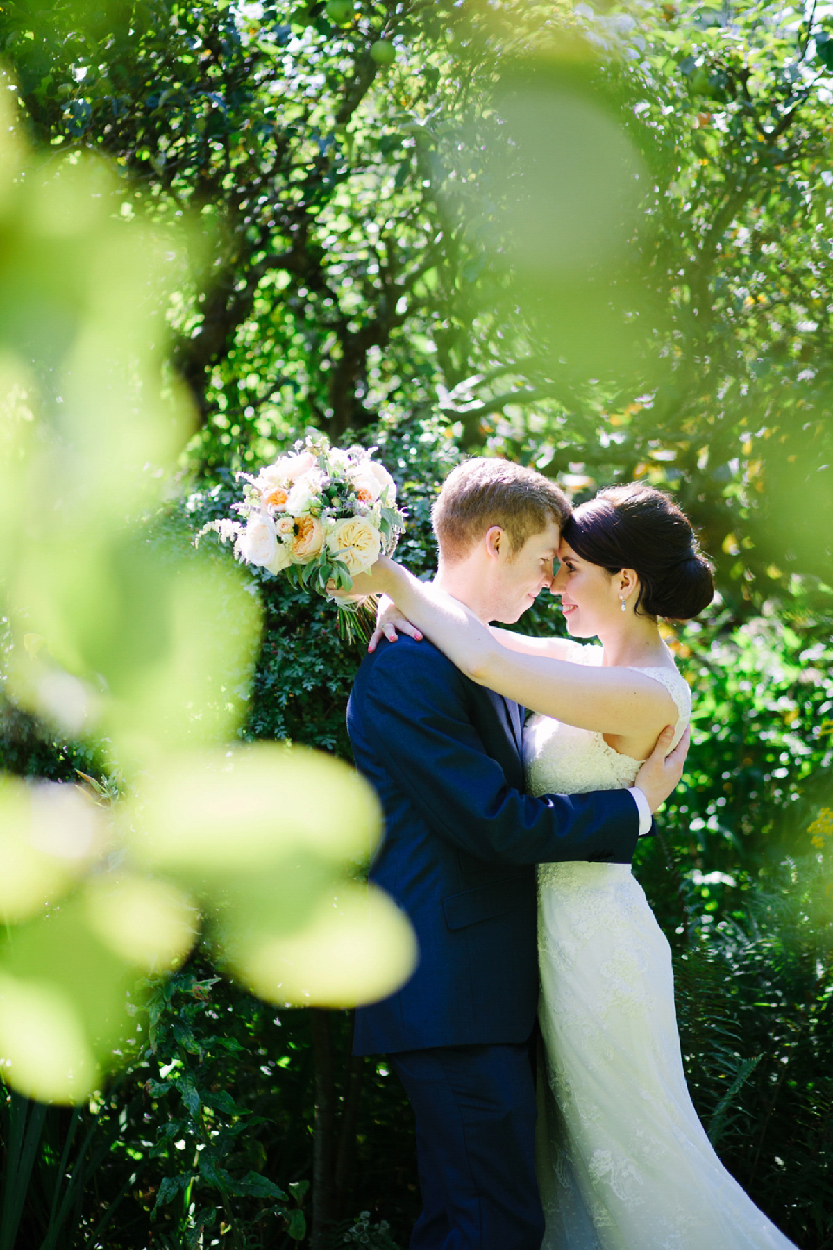 Hollie wore a Lusan Mandongus gown for her tipi wedding set in the Sussex countryside. Photography by Hayley Savage.