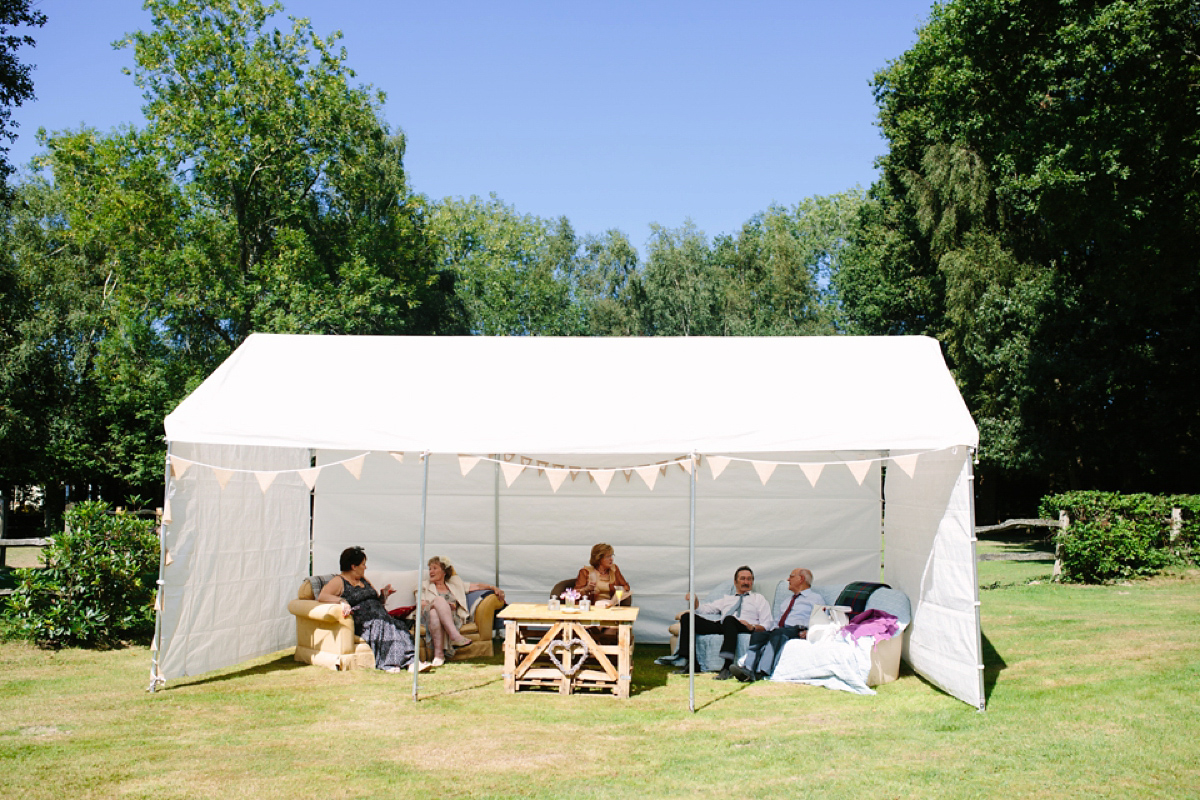 Hollie wore a Lusan Mandongus gown for her tipi wedding set in the Sussex countryside. Photography by Hayley Savage.