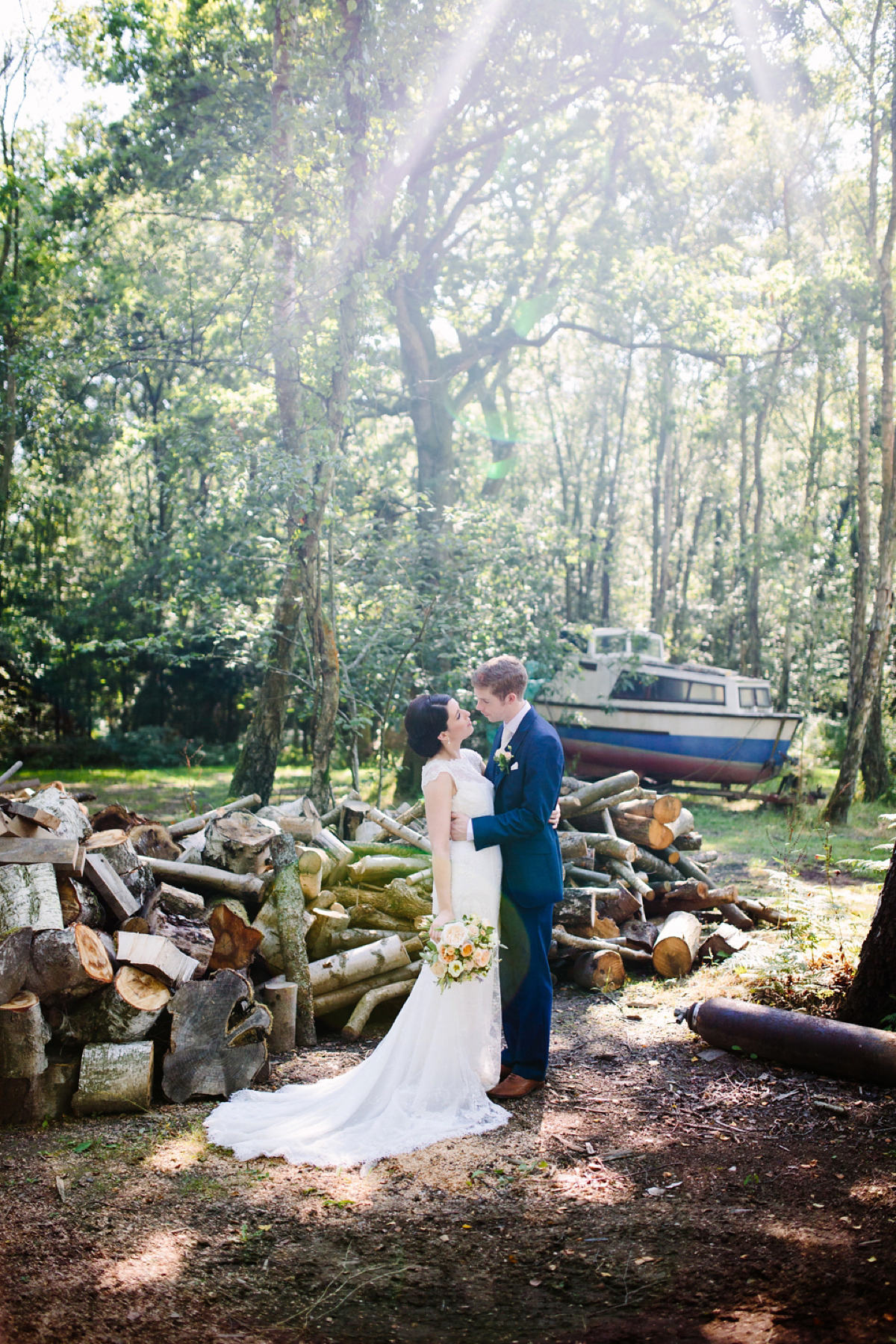 Hollie wore a Lusan Mandongus gown for her tipi wedding set in the Sussex countryside. Photography by Hayley Savage.