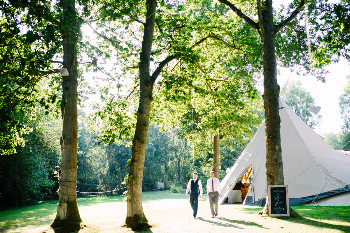 Hollie wore a Lusan Mandongus gown for her tipi wedding set in the Sussex countryside. Photography by Hayley Savage.