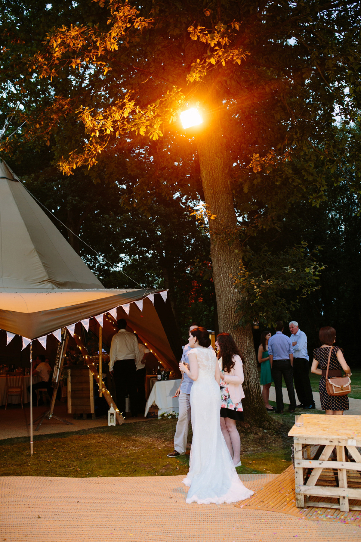 Hollie wore a Lusan Mandongus gown for her tipi wedding set in the Sussex countryside. Photography by Hayley Savage.