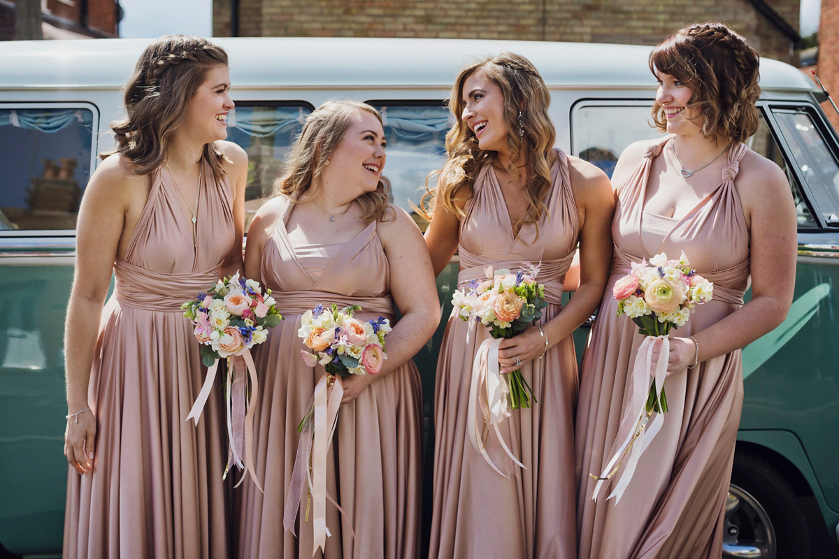 Natalie wore the Frieda gown by Naomi Neoh for her relaxed, elegant and romantic country house wedding. Photography by Mark Tattersall.