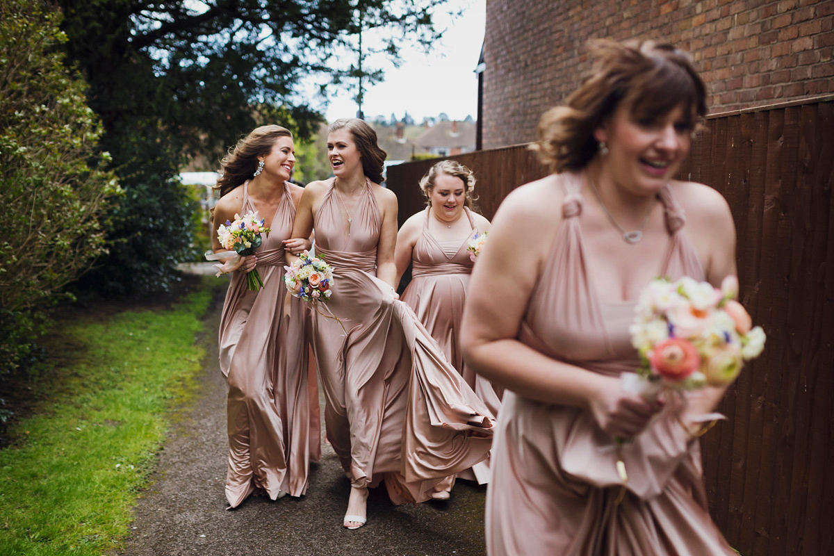 Natalie wore the Frieda gown by Naomi Neoh for her relaxed, elegant and romantic country house wedding. Photography by Mark Tattersall.