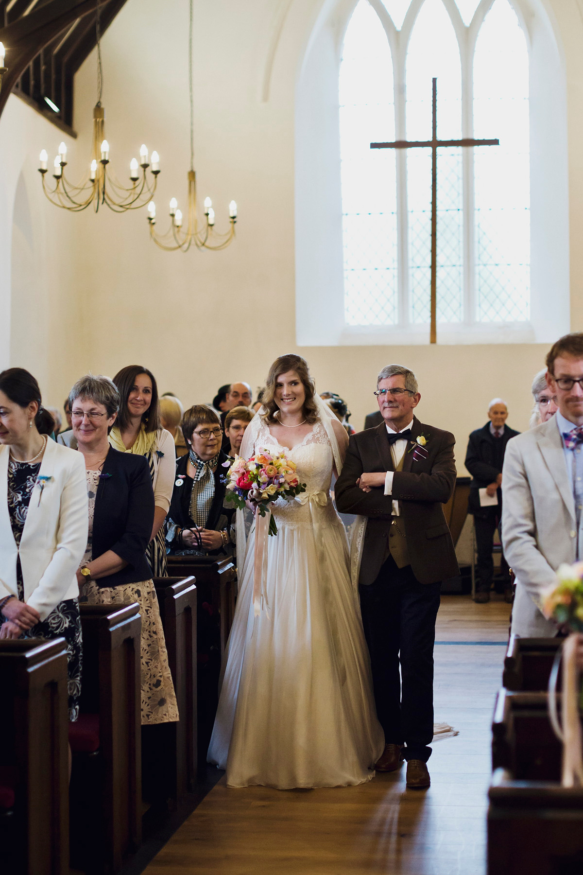 Natalie wore the Frieda gown by Naomi Neoh for her relaxed, elegant and romantic country house wedding. Photography by Mark Tattersall.