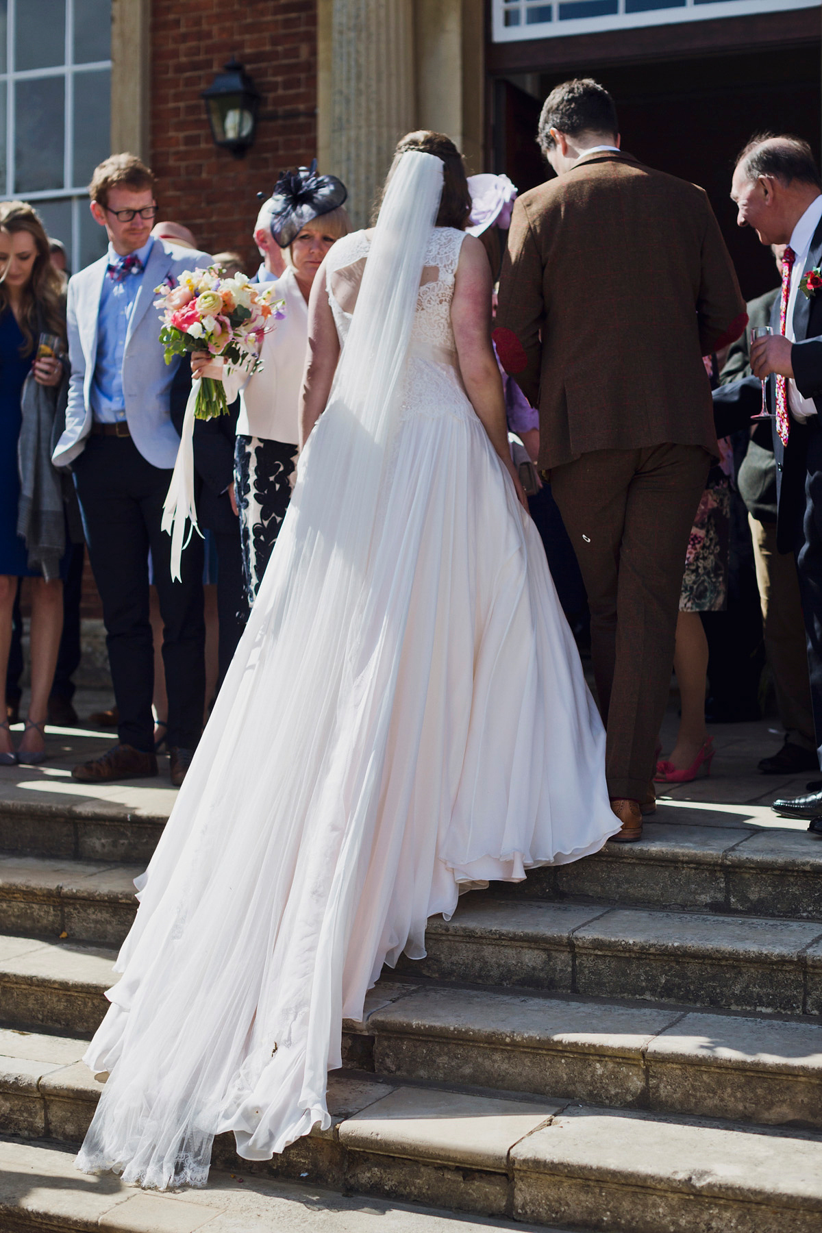 Natalie wore the Frieda gown by Naomi Neoh for her relaxed, elegant and romantic country house wedding. Photography by Mark Tattersall.