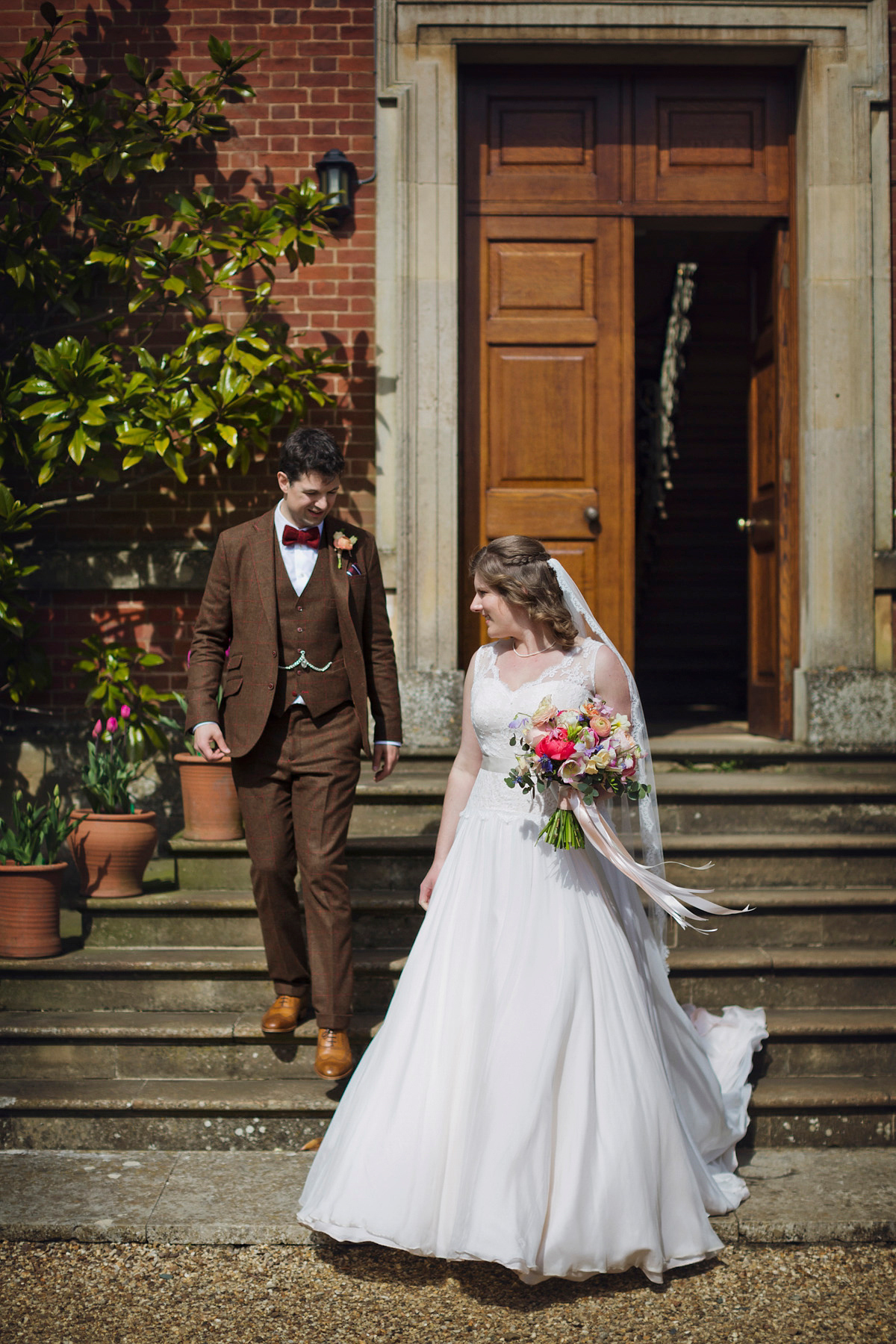 Natalie wore the Frieda gown by Naomi Neoh for her relaxed, elegant and romantic country house wedding. Photography by Mark Tattersall.