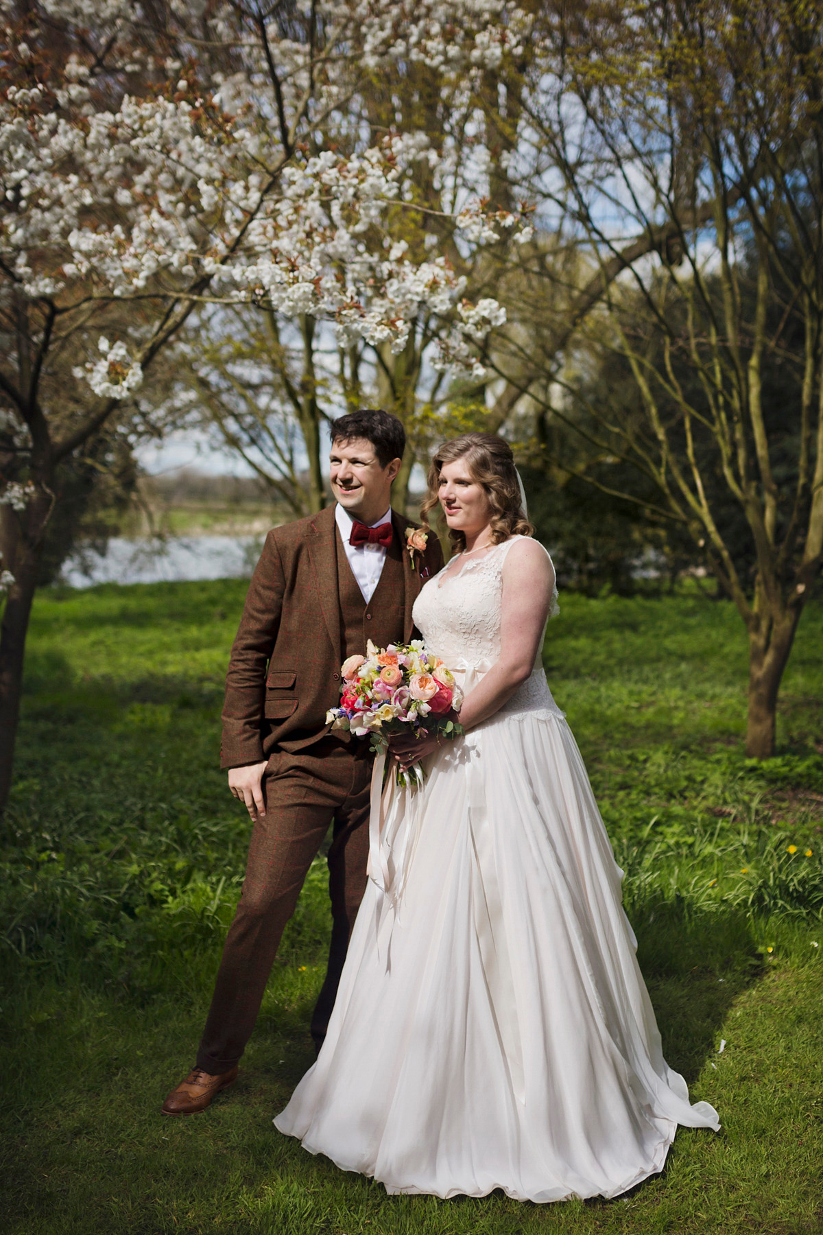 Natalie wore the Frieda gown by Naomi Neoh for her relaxed, elegant and romantic country house wedding. Photography by Mark Tattersall.