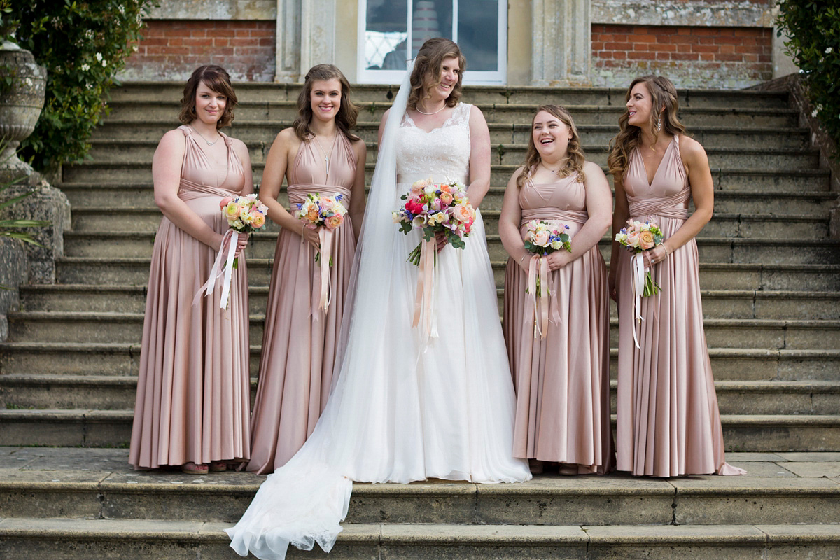 Natalie wore the Frieda gown by Naomi Neoh for her relaxed, elegant and romantic country house wedding. Photography by Mark Tattersall.