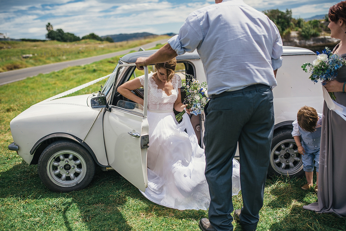 Suzy wore a stunning ombre/dip dye dress for her barefoot beach wedding in New Zealand. Photography by Meredith Lord.