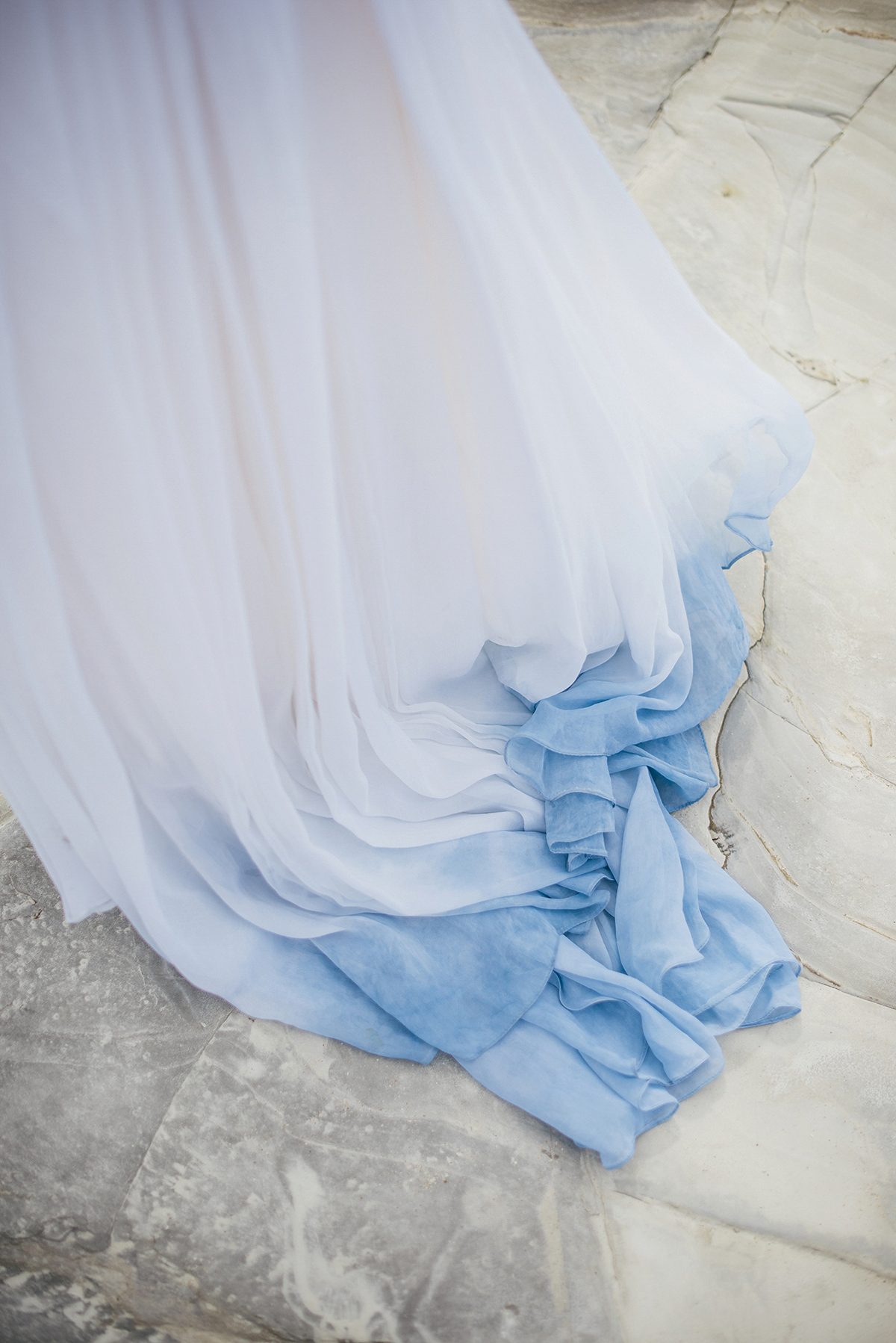 Suzy wore a stunning ombre/dip dye dress for her barefoot beach wedding in New Zealand. Photography by Meredith Lord.