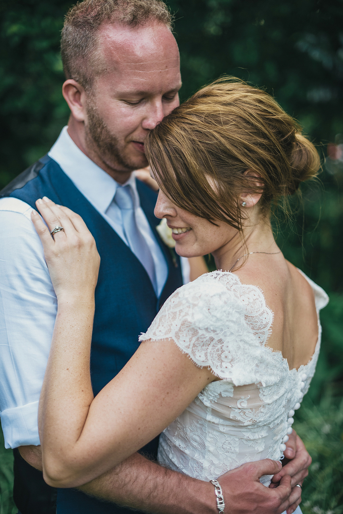 Suzy wore a stunning ombre/dip dye dress for her barefoot beach wedding in New Zealand. Photography by Meredith Lord.