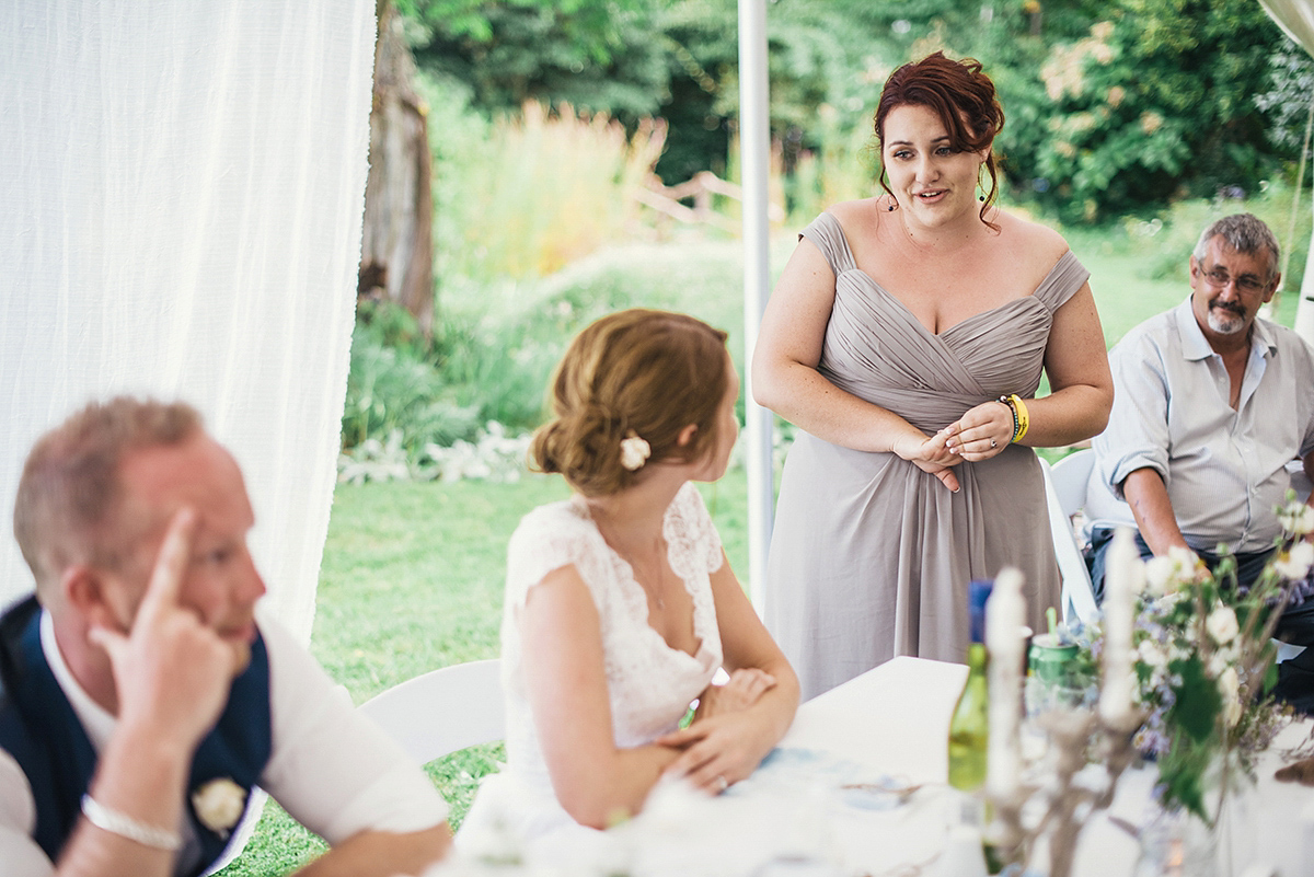 Suzy wore a stunning ombre/dip dye dress for her barefoot beach wedding in New Zealand. Photography by Meredith Lord.