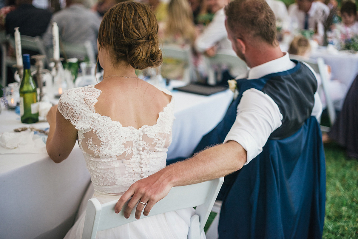 Suzy wore a stunning ombre/dip dye dress for her barefoot beach wedding in New Zealand. Photography by Meredith Lord.